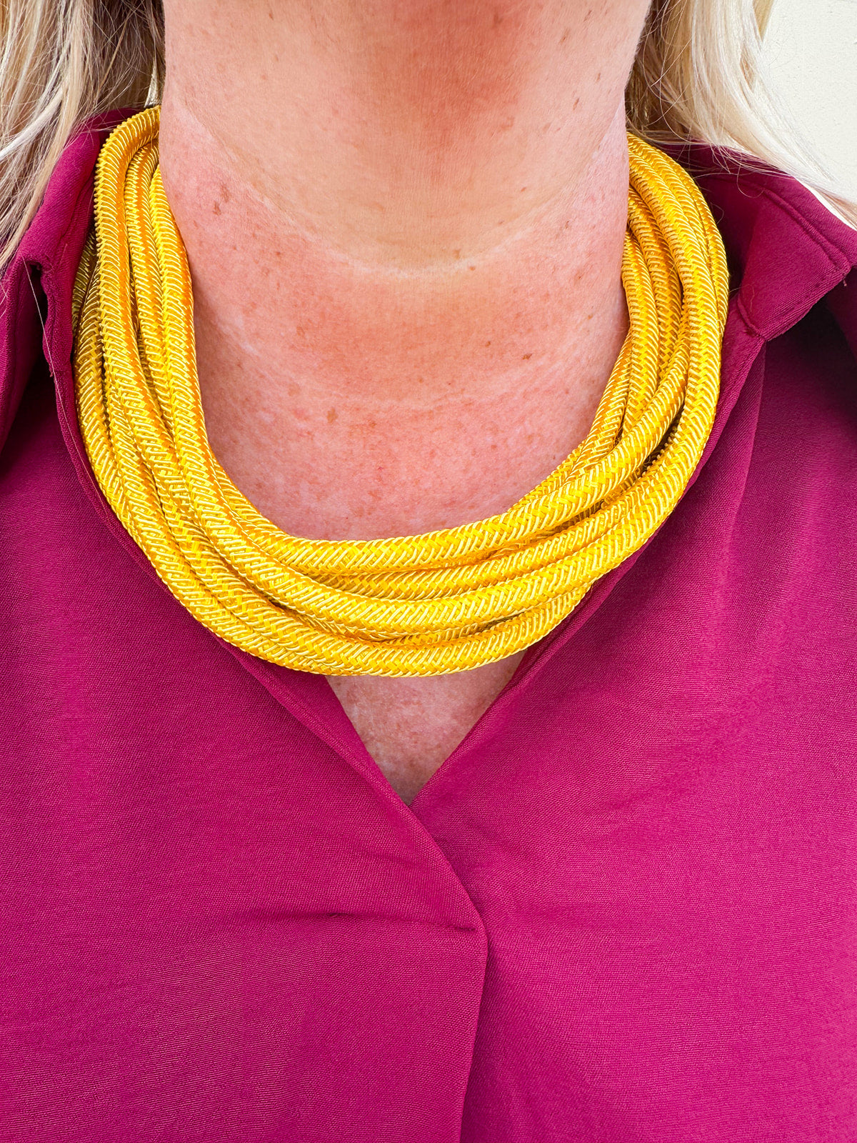 Gold rope-style necklace with adjustable clasp