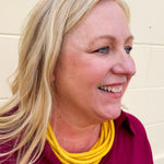 Gold rope-style necklace with adjustable clasp