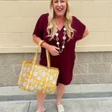 Garnet short sleeve mini dress with deep V-neck, drop shoulders, and side pockets—perfect for gameday.