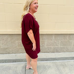 Garnet short sleeve mini dress with deep V-neck, drop shoulders, and side pockets—perfect for gameday.