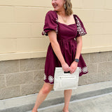Garnet embroidered mini dress with puff sleeves, square neck, floral detailing, and scalloped hem—perfect for FSU gameday