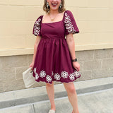Garnet embroidered mini dress with puff sleeves, square neck, floral detailing, and scalloped hem—perfect for FSU gameday