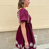 Garnet embroidered mini dress with puff sleeves, square neck, floral detailing, and scalloped hem—perfect for FSU gameday