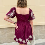 Garnet embroidered mini dress with puff sleeves, square neck, floral detailing, and scalloped hem—perfect for FSU gameday