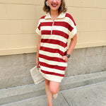 Mini dress with a zippered split-neck collar, cuffed sleeves, and colorblock-style stripes—sporty, stylish, and perfect for Gameday wear.