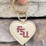 Gold heart-shaped purse charm with garnet FSU logo and gold-toned hardware, ideal for bags or keys.