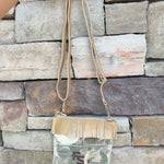 Clear crossbody purse with gold vegan leather, fringe trim, and FSU logo, designed for stadium approval and style.