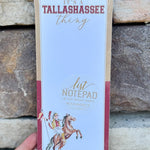 Skinny notepad with “It’s a Tallahassee Thing” text, Osceola and Renegade artwork, and garnet and gold painted edges