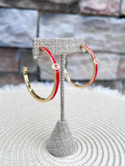 Gold hoop earrings with red enamel detailing and the Georgia Bulldogs "G" logo.