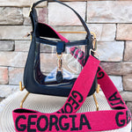 Red hand-beaded handbag strap with black "GEORGIA" lettering and gold-tone clasp hardware.