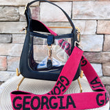 Red hand-beaded handbag strap with black "GEORGIA" lettering and gold-tone clasp hardware.