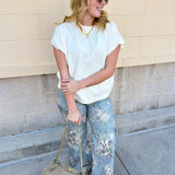 Ivory short-sleeve knit top with subtle tonal criss-cross texture