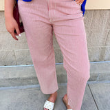 High-rise red and ivory striped wide straight leg pants with a structured twill fabric and raw hem.