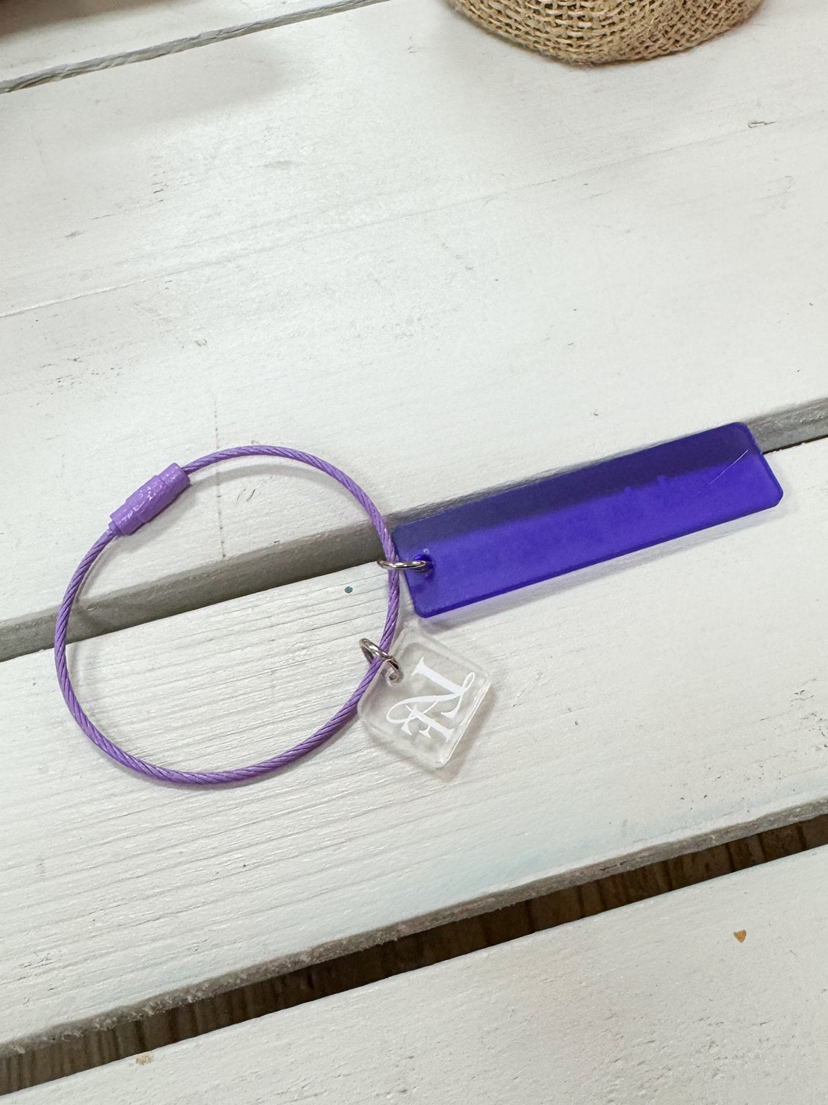 Purple Work in Progress Thread Ring needlepoint accessory with acrylic tag