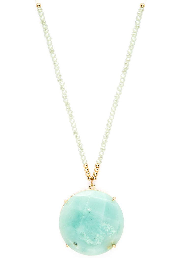 Lori Disk Pendant Necklace featuring a circular Amazonite pendant with a gold and light blue beaded chain.