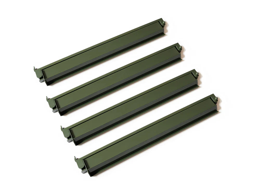 Matcha green mahjong racks with attached pushers in a soft earthy green finish