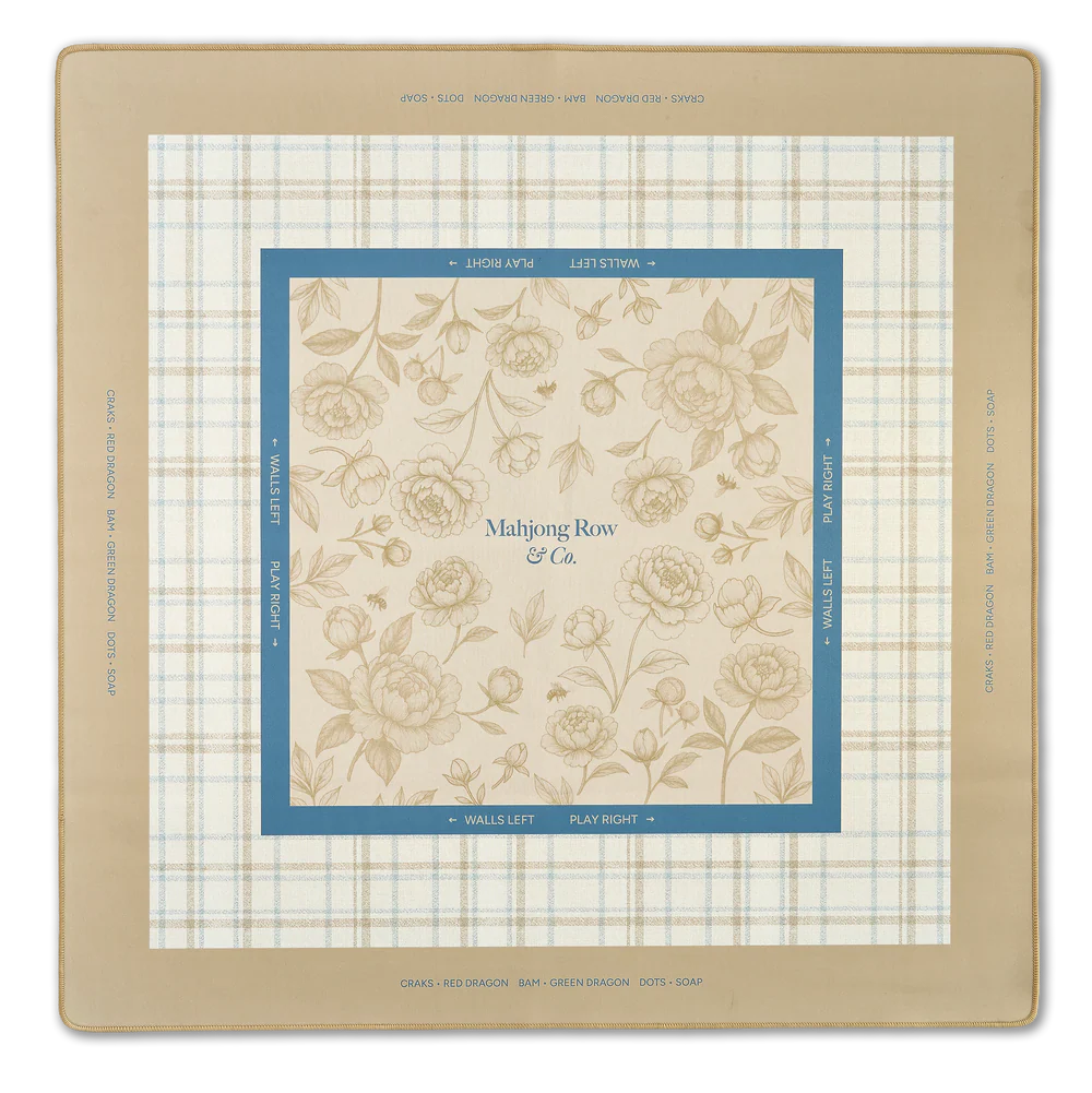 Warm honey mahjong mat with Chinoiserie-inspired peony and bee toile design on a neutral background
