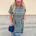 Lainey Midi Dress Orchid Damask Olive with dark green background, blue floral designs, white leaf accents, short sleeves, and ruffled collar