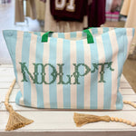 Blue and white striped NDLPT needlepoint tote bag with green teal handle
