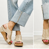 Light gold raffia cork wedges with gold rivets, Velcro heel strap, and a cushioned footbed