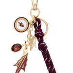 Gold and enamel FSU bag charm with logo, pearl, and garnet accents