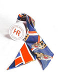 Navy twilly scarf with red and white stripes and tiger print border, styled for bold game day or casual wear