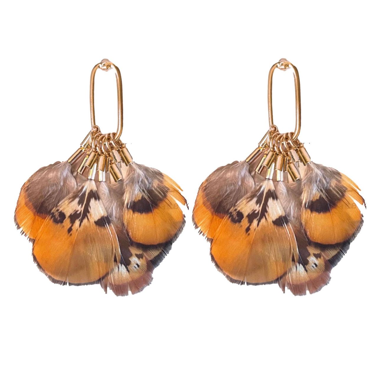 Quail feather tassel statement earrings with speckled feathers and soft tassels, displayed on a neutral background