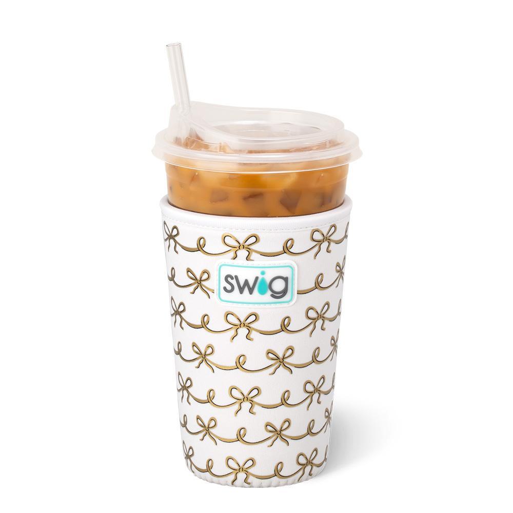 Medium iced drink Coolie with ivory background and gold metallic bow design.
