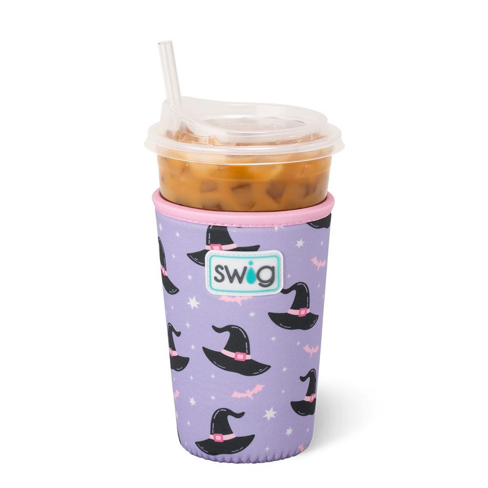 Lavender iced cup sleeve decorated with bats, stars, and witch hats, designed to fit medium and large iced beverages.