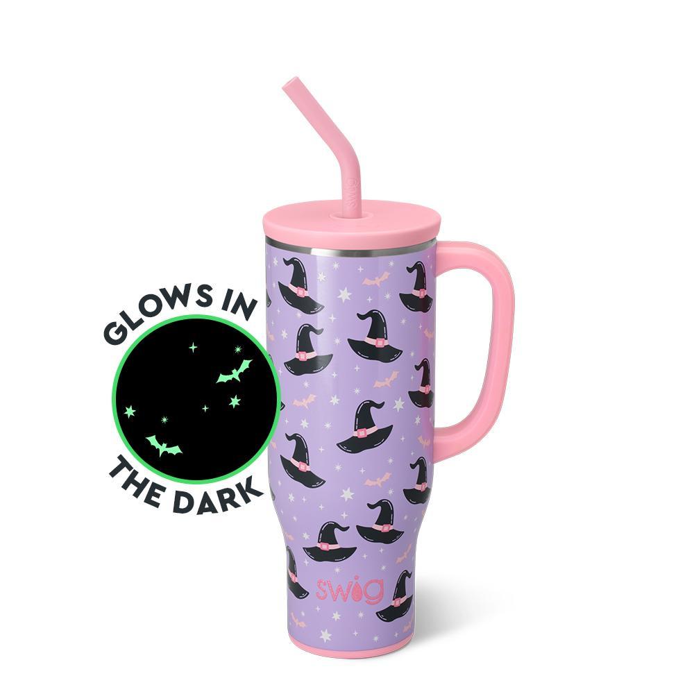 A 30oz insulated Mega Mug with lavender background decorated with bats, stars, and witch hats, featuring a handle and straw.