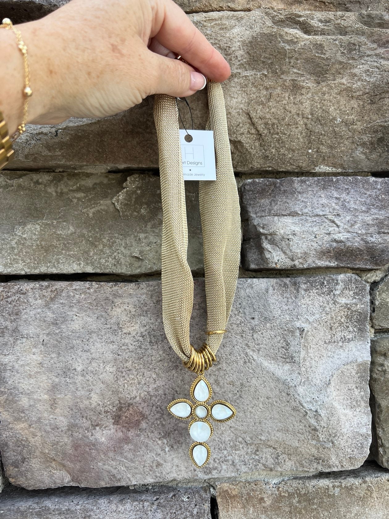Gold scarf necklace with white crystal cross pendant handcrafted by Hart Designs.
