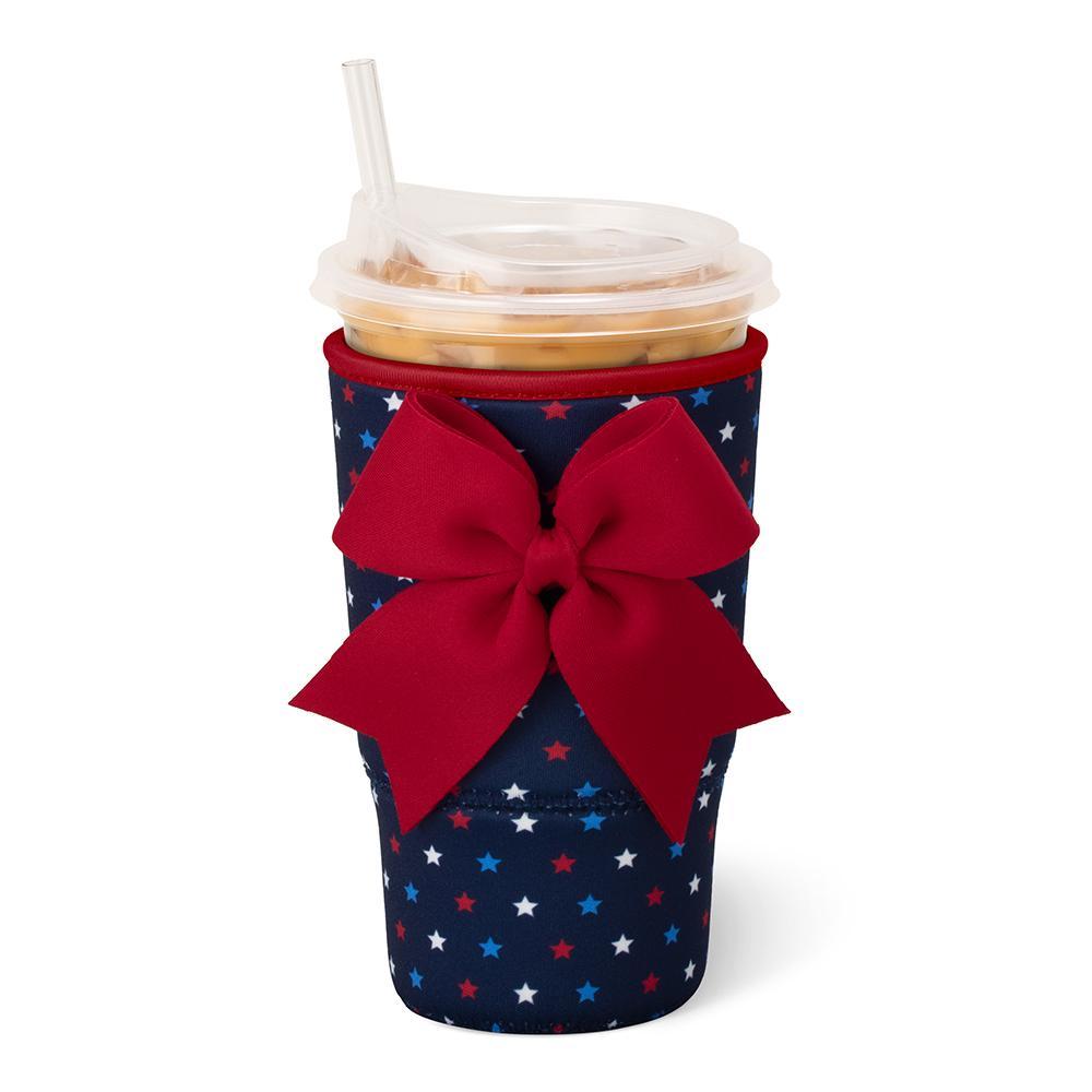 Oh My Stars Large Iced Cup Coolie featuring red, white, and blue stars scattered across a navy background on an insulated neoprene cup sleeve with hand strap.