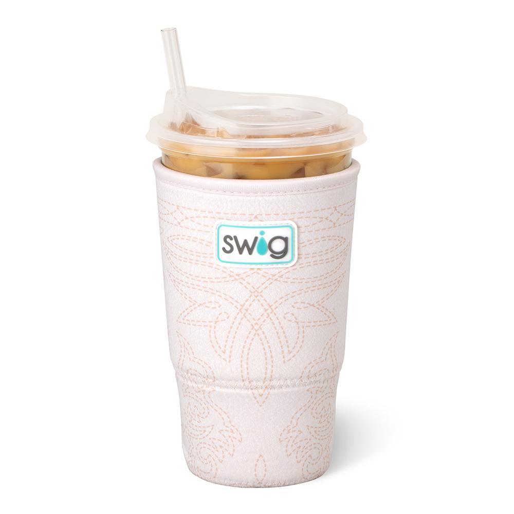 Saddle Stitch Cream Large Iced Cup Coolie featuring a cream faux-leather inspired pattern with tan stitched detailing on an insulated neoprene cup sleeve with hand strap.