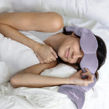 Wisteria purple Nodpod weighted sleep mask with four weighted pods and reversible cooling cotton and microfleece fabrics.