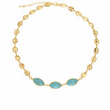 Stone bead necklace with diamond-shaped beads and three eye-shaped turquoise accents