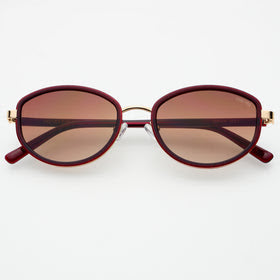 Burgundy oval sunglasses with biodegradable acetate frame, premium nylon lenses, and sleek lightweight design.
