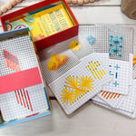 Next-Level Needlepoint card deck by Emma Homent with 50 stitch instructions