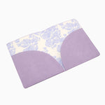 Lavender cruelty-free leather mahjong card folio with coordinating printed interior designed to hold NMJL and IMC mahjong cards.