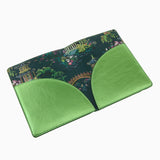 Metallic green cruelty-free leather mahjong card folio with coordinating printed interior designed to hold NMJL and IMC mahjong cards.