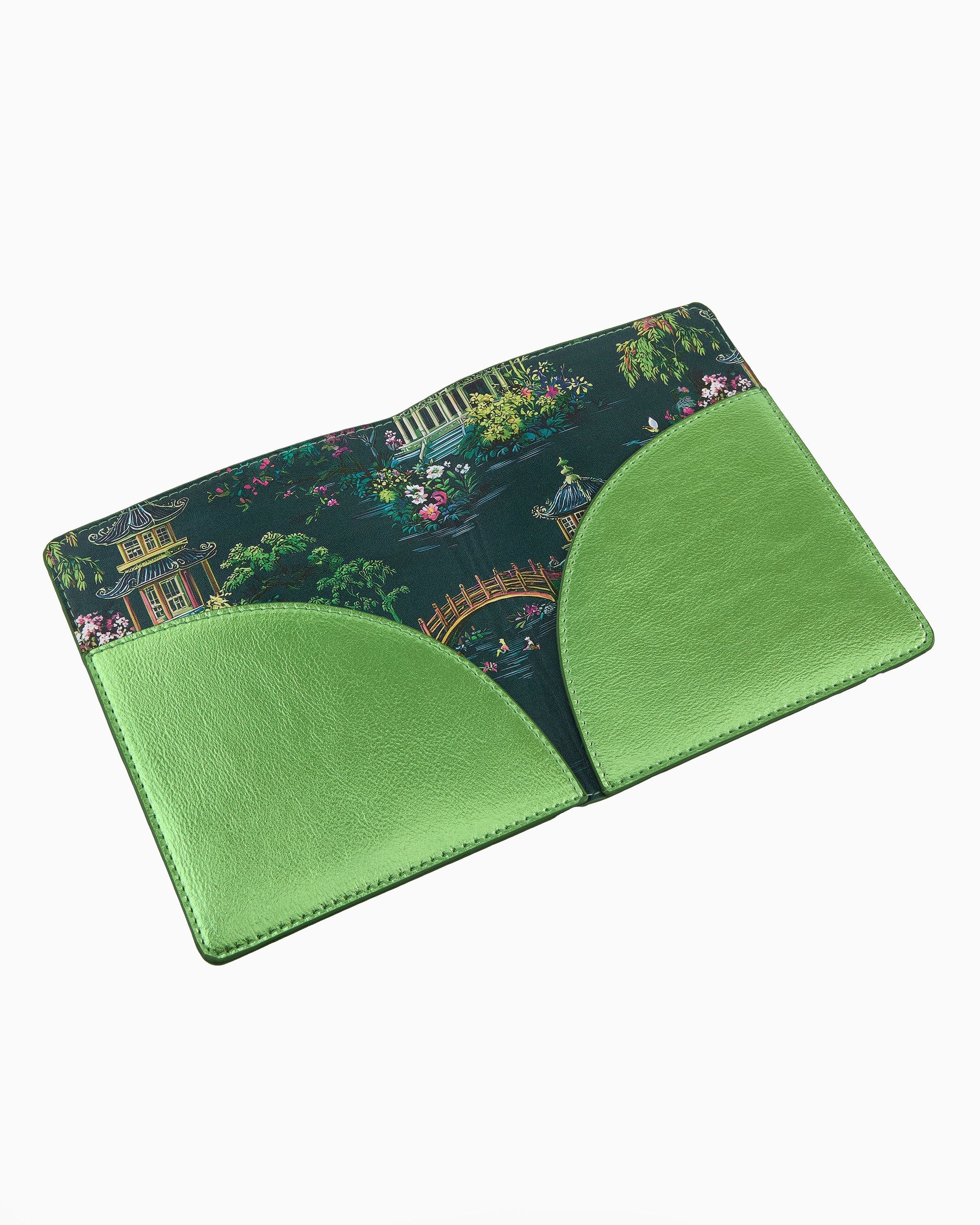 Metallic green cruelty-free leather mahjong card folio with coordinating printed interior designed to hold NMJL and IMC mahjong cards.