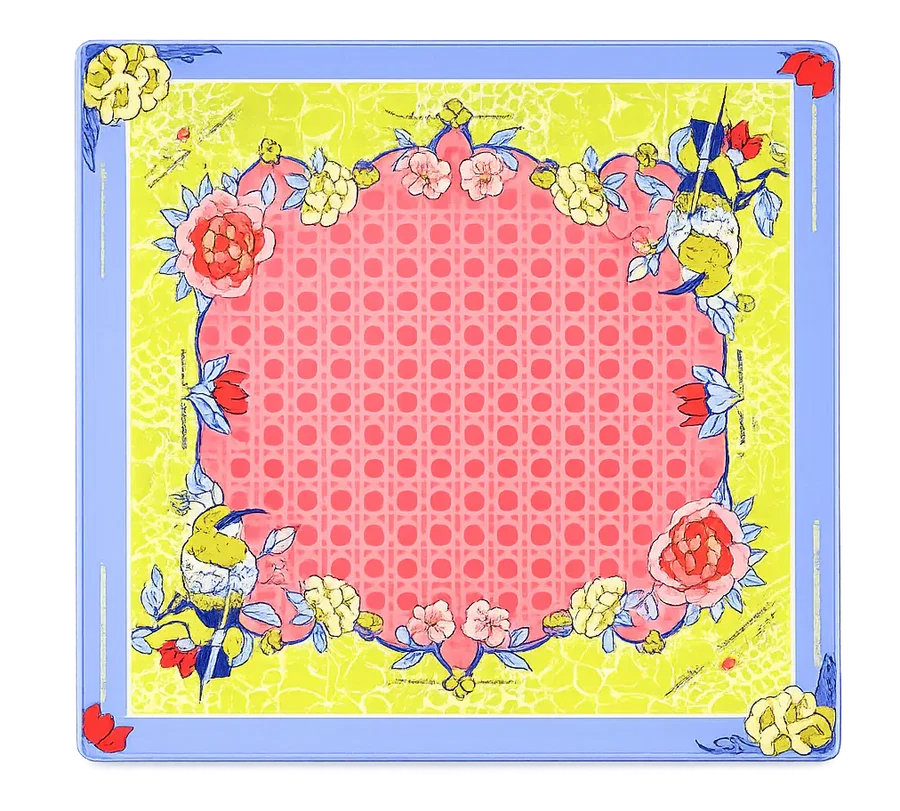 Botanical mahjong mat featuring a pastel blue border, yellow crackle background, pink geometric center, watercolor flowers, and blue-and-yellow birds.
