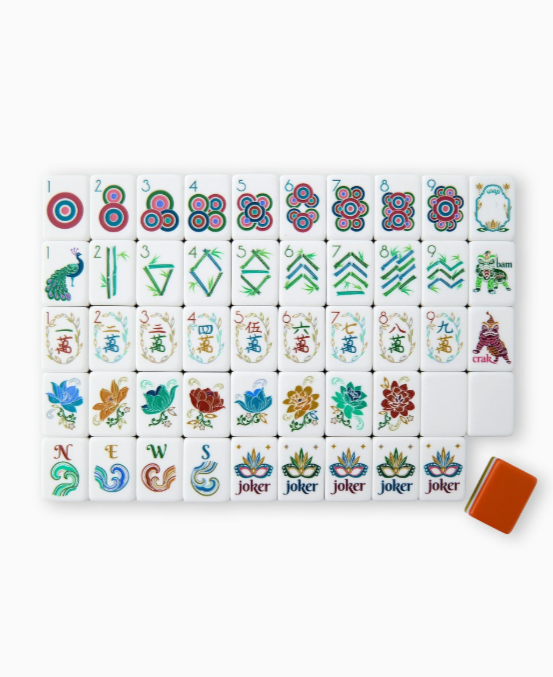 Sierra Mahjong Tiles in layered light blue and olive green with burnt orange backs, displayed with dice/coin bag and instructional cards