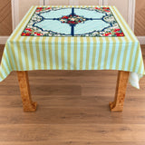 Palm Beach Stripe Tablecloth On a Burl wood table with the Winterberry Mahjong mat 