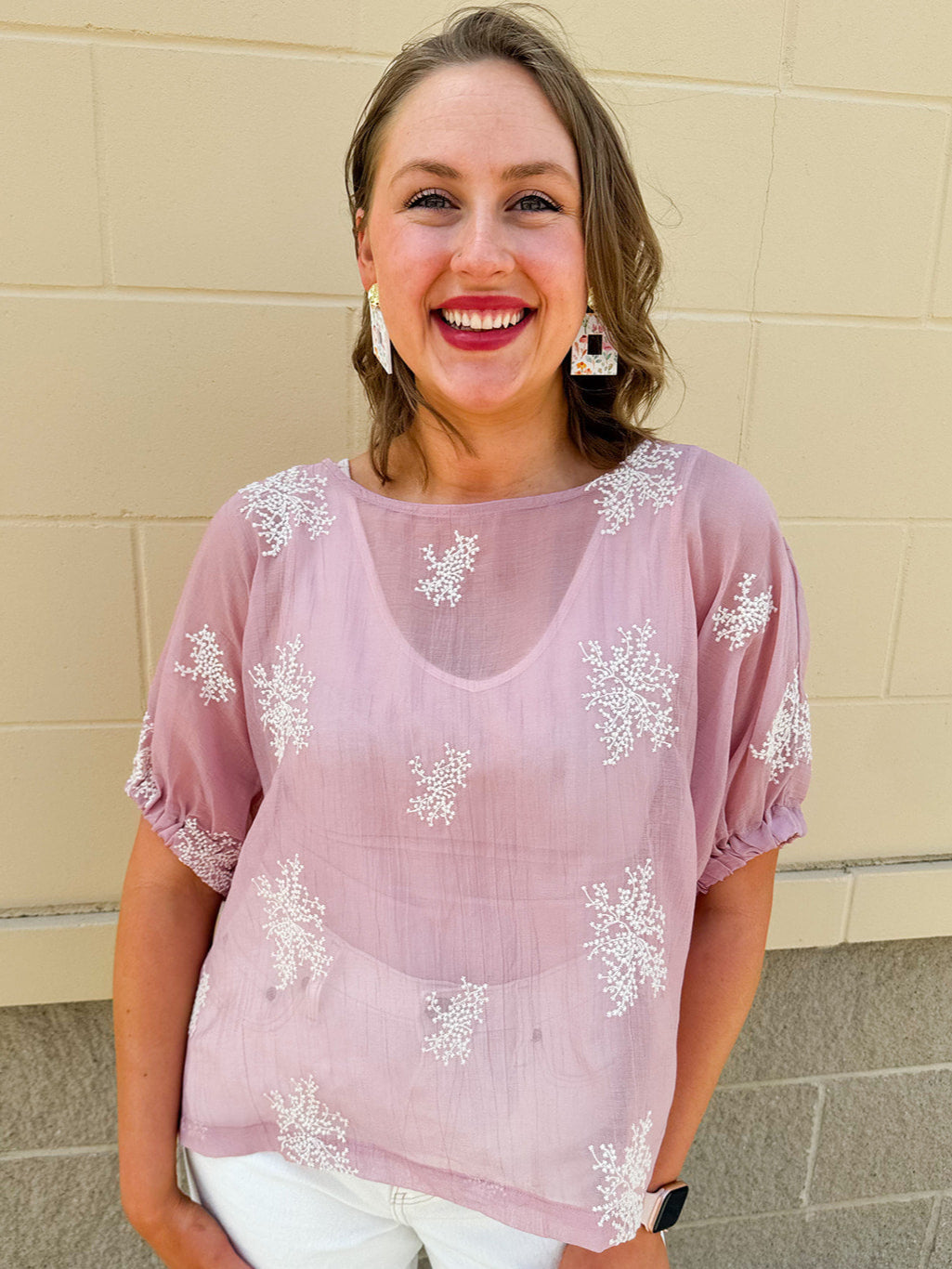 Sheer pink embroidered top with short dolman sleeves and cream floral detailing