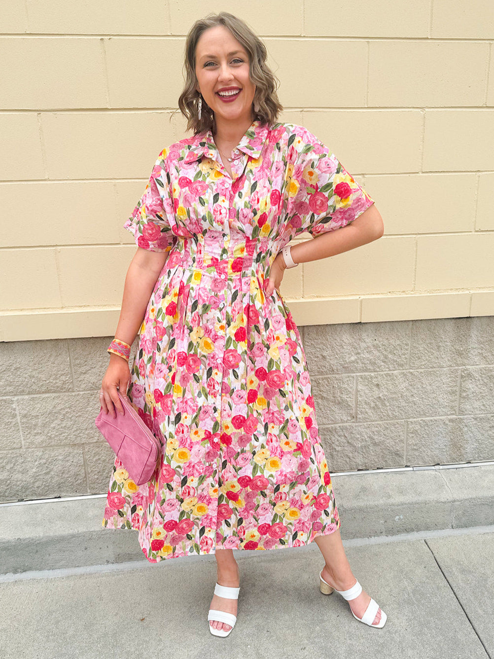 Floral cotton midi dress with pink and yellow flowers, drop shoulder sleeves, smocking, and pockets