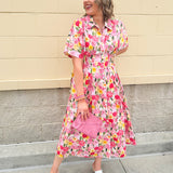 Floral cotton midi dress with pink and yellow flowers, drop shoulder sleeves, smocking, and pockets
