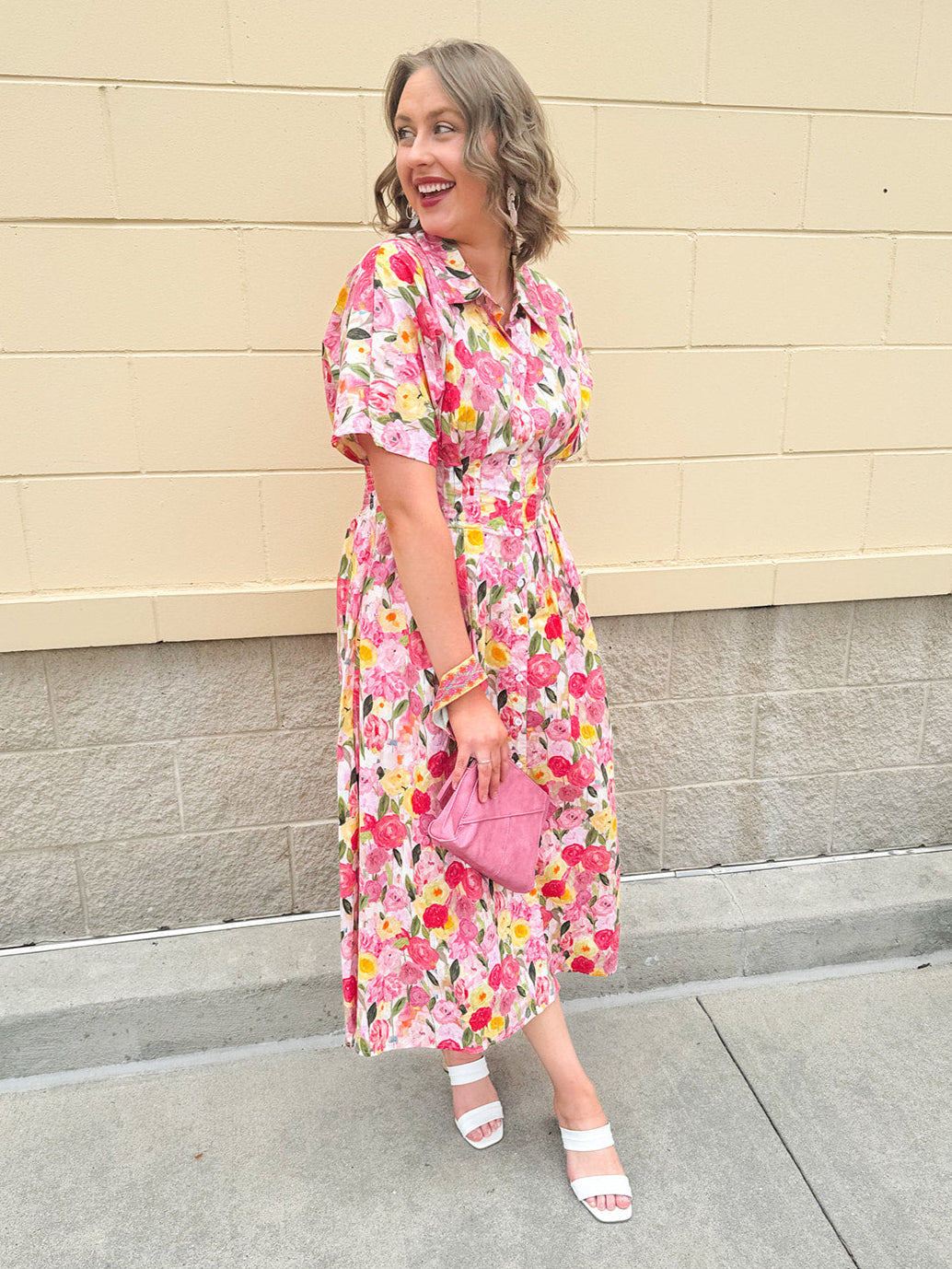 Floral cotton midi dress with pink and yellow flowers, drop shoulder sleeves, smocking, and pockets