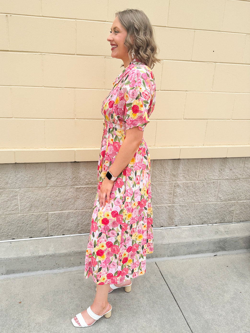 Floral cotton midi dress with pink and yellow flowers, drop shoulder sleeves, smocking, and pockets