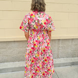 Floral cotton midi dress with pink and yellow flowers, drop shoulder sleeves, smocking, and pockets