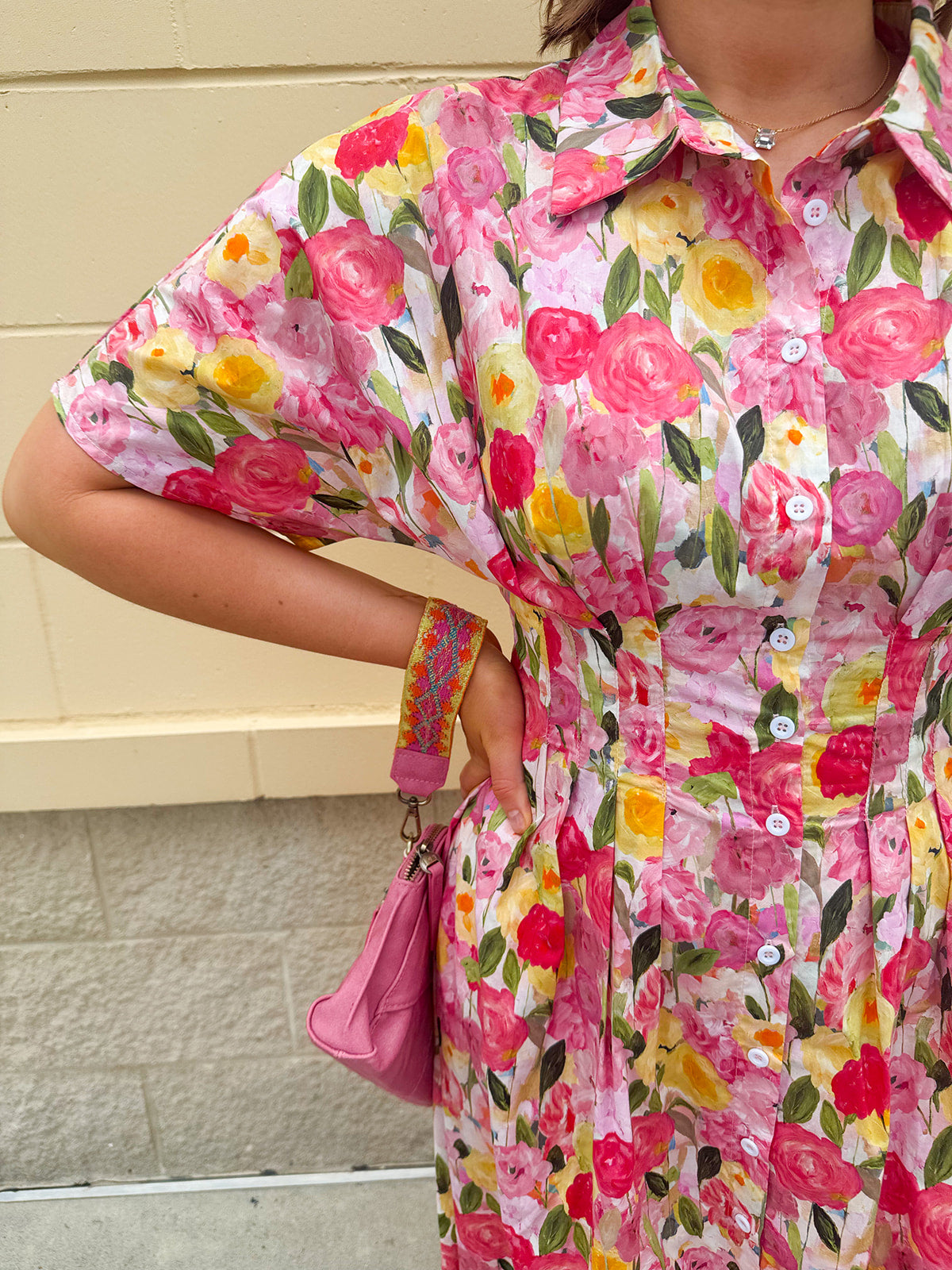 Floral cotton midi dress with pink and yellow flowers, drop shoulder sleeves, smocking, and pockets